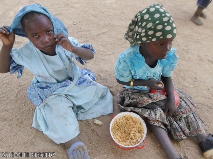 Displaced Refugees Children Eating Rice on Christmas Day- DEC. 25,2013 